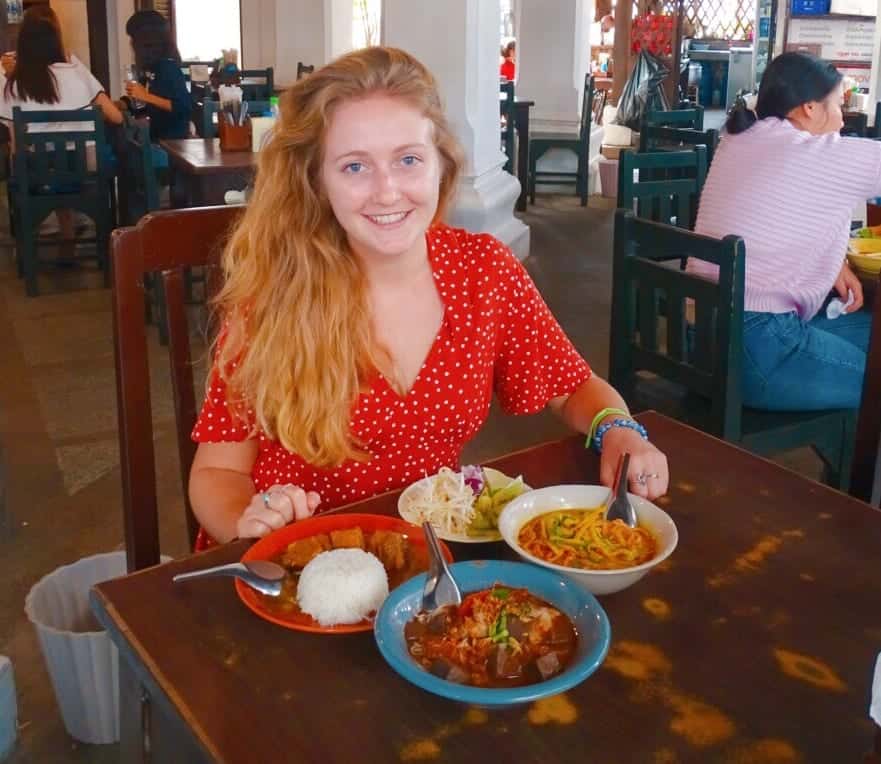 Girl eating local food Chiang Mai 