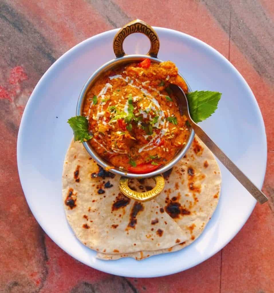 Plate of curry and naan in Pushkar