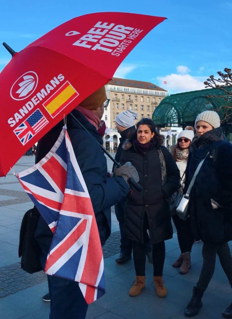 Sandermans tour guide with red umbrella