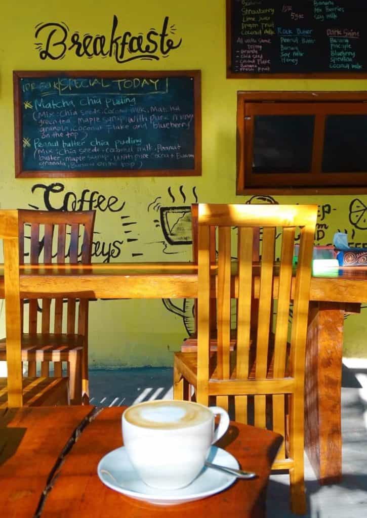 Coffee against yellow wall 