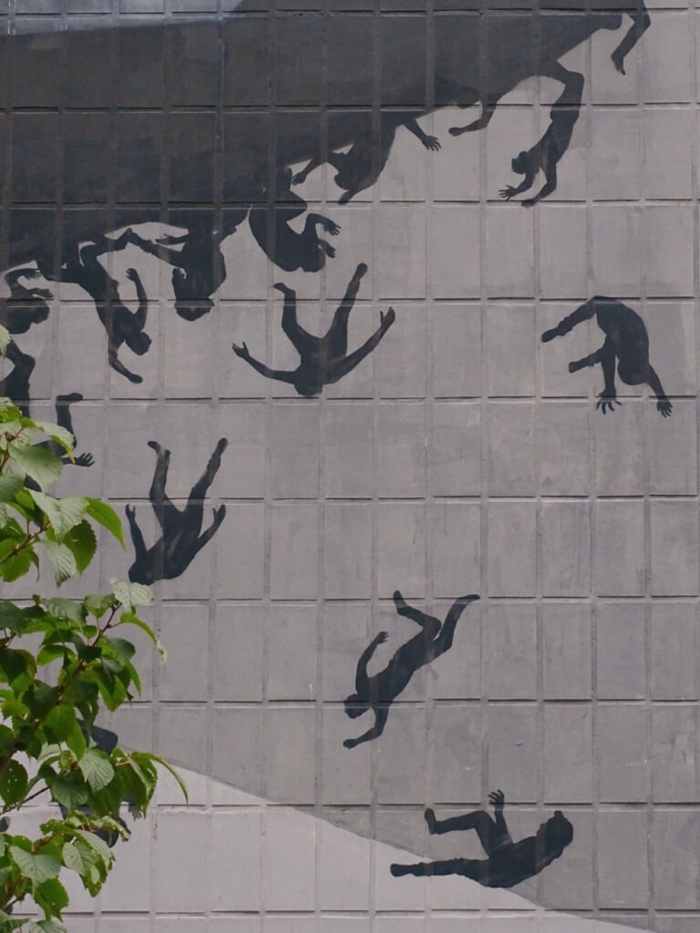 Falling figures graffiti