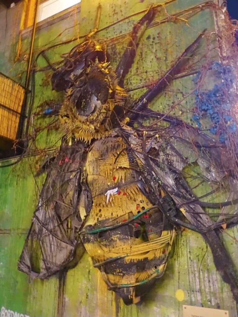 Bee mural non touristy place Lisbon