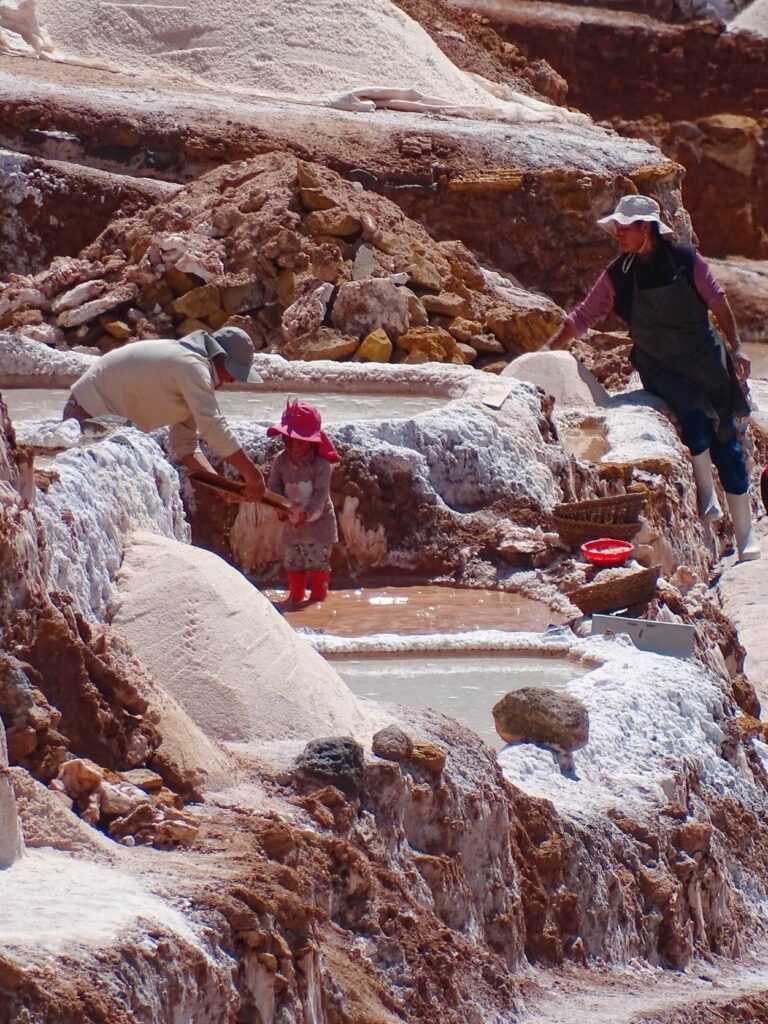 Locals working at salt mines