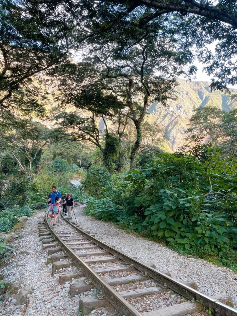 Walking on railway tracks to finish the salkantay trek